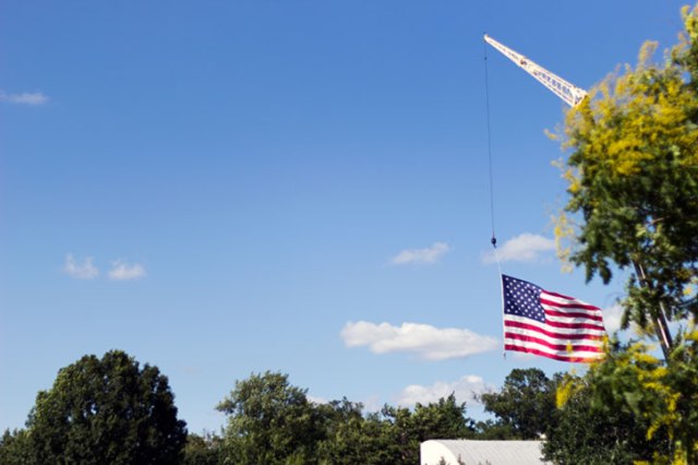 American flag hanging from a crane in Fredrick Maryland